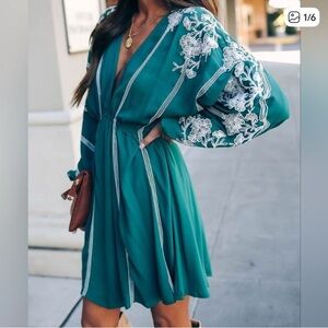 Elegant Green Dress with White Embroidery on Flowy Sleeve